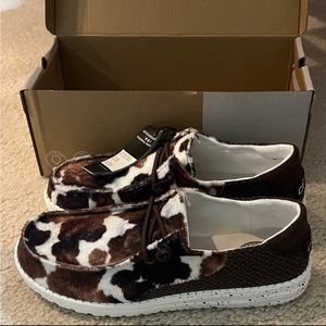 Brand new with box Hey Dude Tartan Cow. Buckle exclusive.